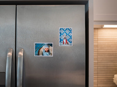 Stainless steel fridge showing 3 by 5 inch magnetic photo pockets in vertical and horizontal position